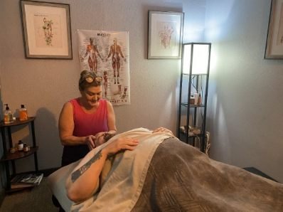 Kara working beside the anatomy charts